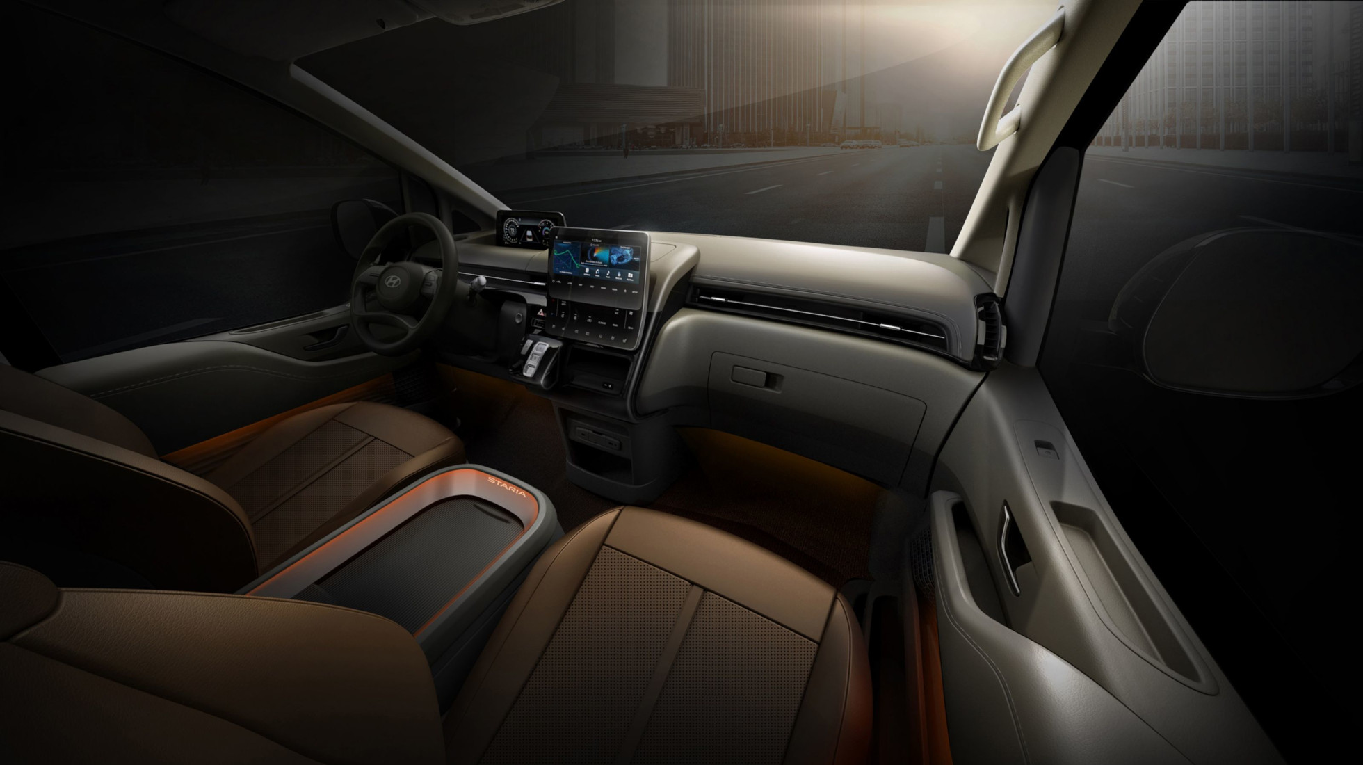 Detailní pohled na přední sedadla a palubní desku v modelu Hyundai Staria.